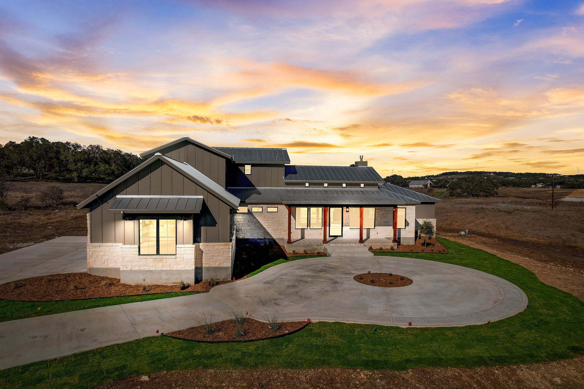 Belle Oaks custom home exterior at sunset